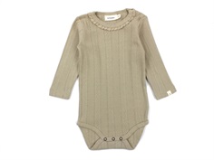 Lil Atelier body tuffet ruffle